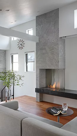 EcoSmart Fire XL500 Ethanol Burner adds modern indoor heating to a private residence living room with a sleek residential installation.
