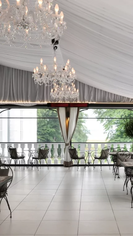 Heatscope Vision 3200W Radiant Heater provides discreet ceiling-mounted infrared heat for an indoor restaurant dining space.