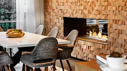 EcoSmart Fire XL900 Ethanol Burner adds modern ambience to The Brindabella dining room with a sleek brushed chrome finish.