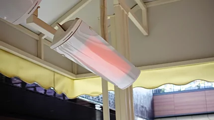 Heatscope Heaters Pure 3000W Radiant Heater wall‑mounted in a private residence kitchen, electric infrared heating.