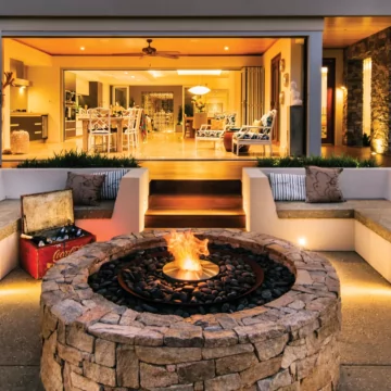 EcoSmart Fire AB8 Ethanol Burner elevates a residential outdoor patio at Oswald Down South Home with a ventless bioethanol fireplace.