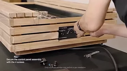 Securing the control panel with 4screws